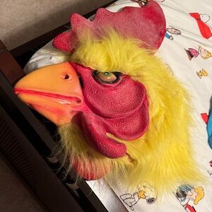 Vibrant Rooster Mask with Yellow Feathers